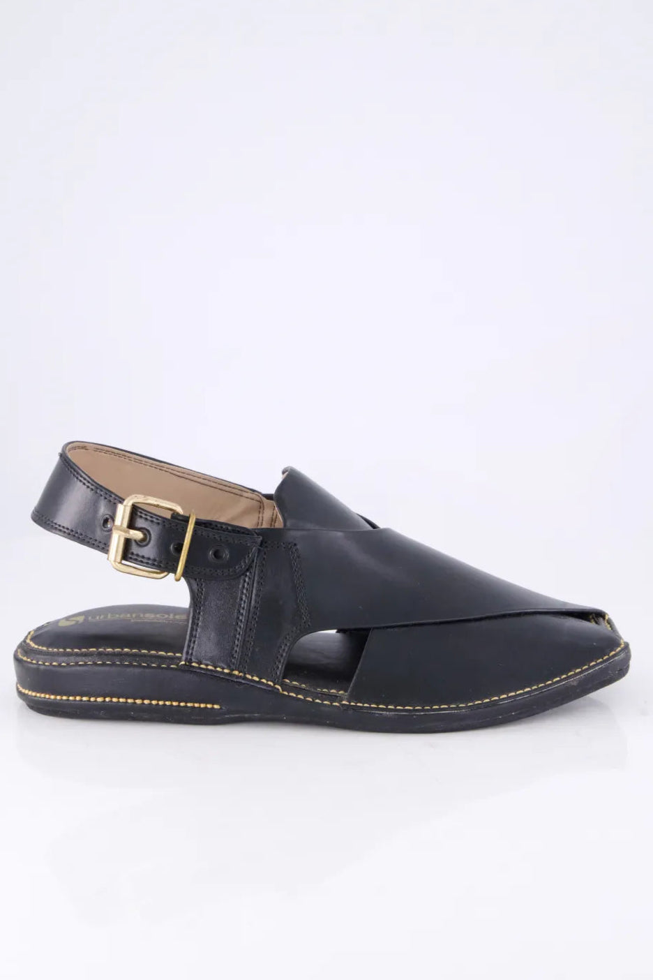 Black sandal with a gold buckle on a white background