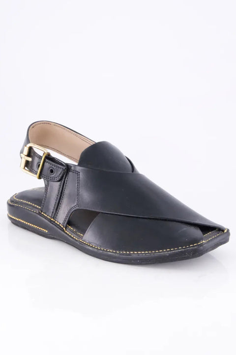Black sandal with a strap on a white background